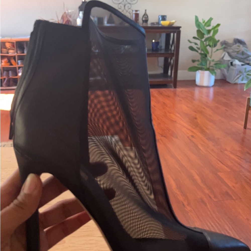 Black leather booties with mesh